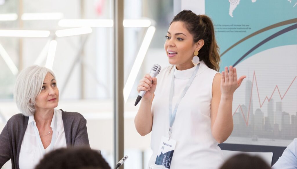 Female presenting the course to uncover common habits that undermine vocal confidence.