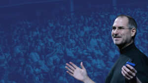 Professional presenter Steve Jobs uses strategic pauses and confident vocal delivery during a keynote presentation
